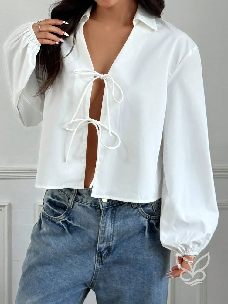 Blusa com Amarração Frontal e Manga Longa Bufante Blusa com Amarração Frontal e Manga Longa Bufante