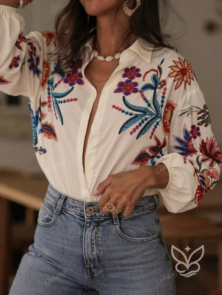 Blusa com Bordado Floral Colorido e Manga Longa Boho Blusa com Bordado Floral Colorido e Manga Longa Boho