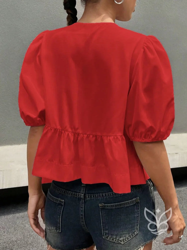 Blusa com Laços Delicados e Manga Bufante Estruturada Blusa com Laços Delicados e Manga Bufante Estruturada