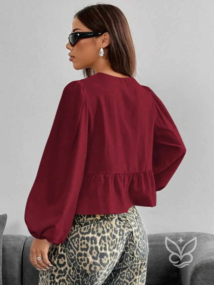 Blusa com Laços Frontais e Manga Longa Bufante Blusa com Laços Frontais e Manga Longa Bufante