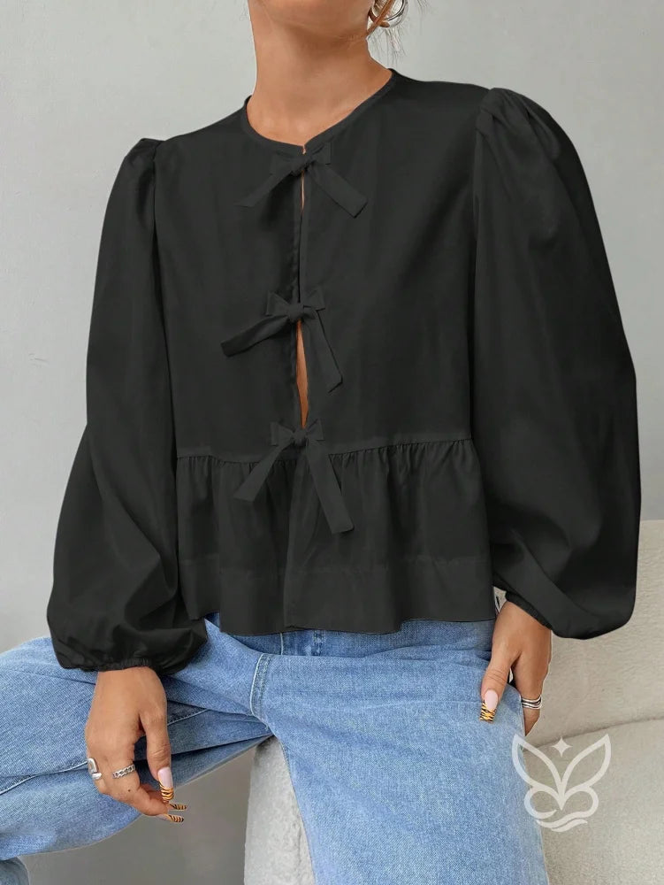 Blusa com Laços Frontais e Manga Longa Bufante Blusa com Laços Frontais e Manga Longa Bufante