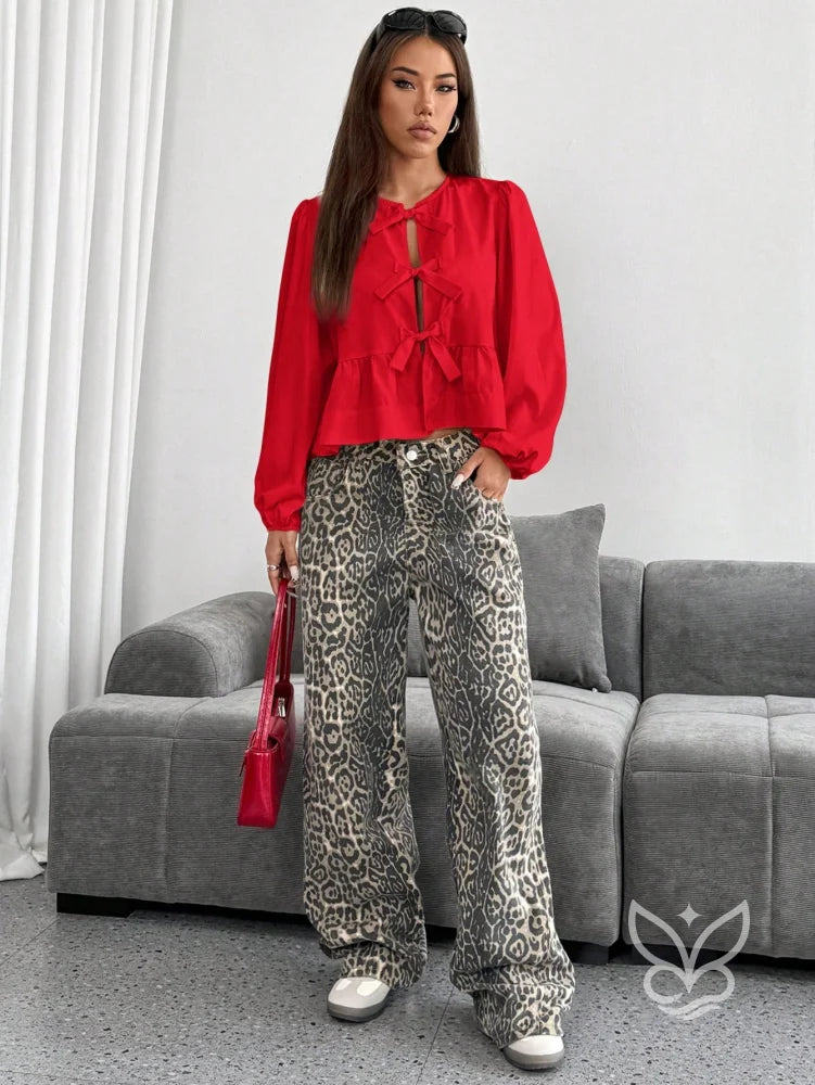 Blusa com Laços Frontais e Manga Longa Bufante Blusa com Laços Frontais e Manga Longa Bufante