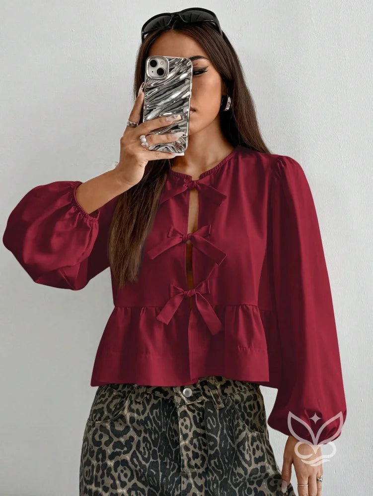 Blusa com Laços Frontais e Manga Longa Bufante Blusa com Laços Frontais e Manga Longa Bufante