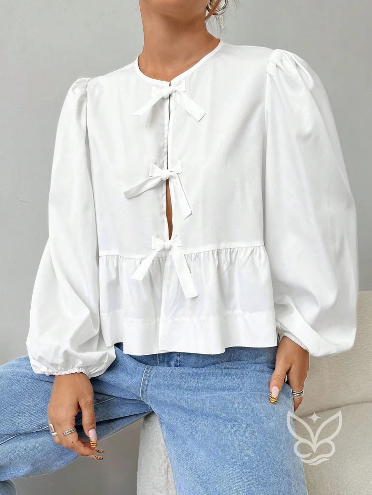 Blusa com Laços Frontais e Manga Longa Bufante Blusa com Laços Frontais e Manga Longa Bufante