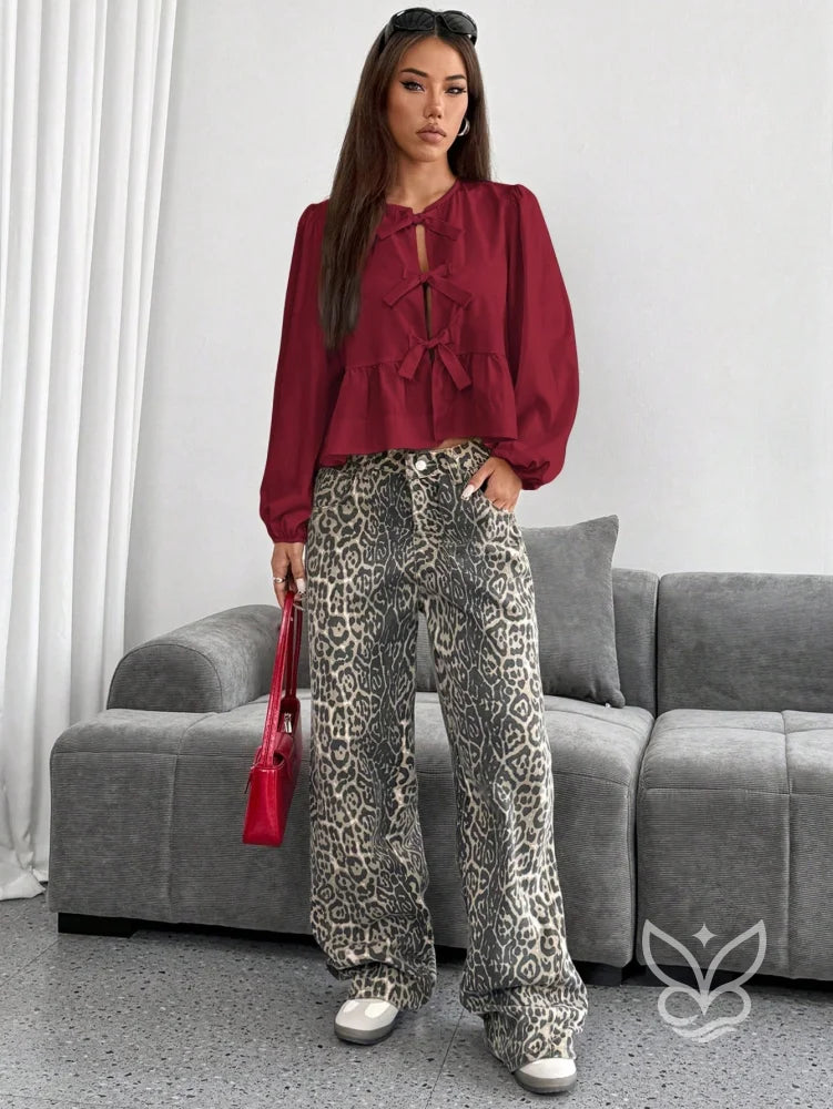 Blusa com Laços Frontais e Manga Longa Bufante Blusa com Laços Frontais e Manga Longa Bufante
