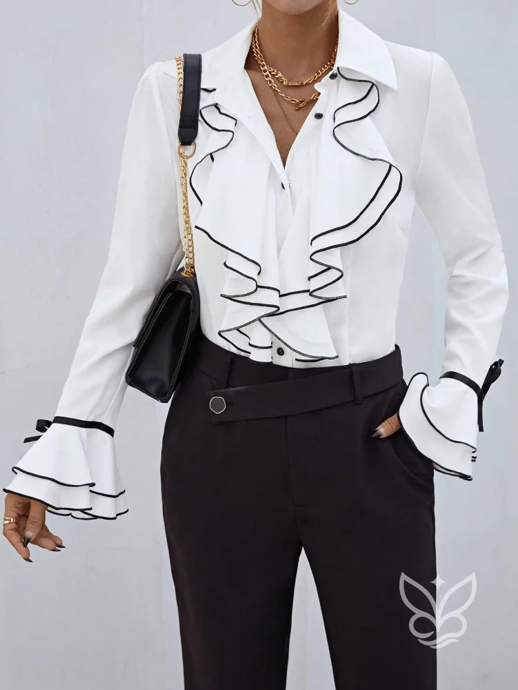 Blusa Com Manga Flare Babados E Contorno Contrastante Blusa Com Manga Flare Babados E Contorno Contrastante