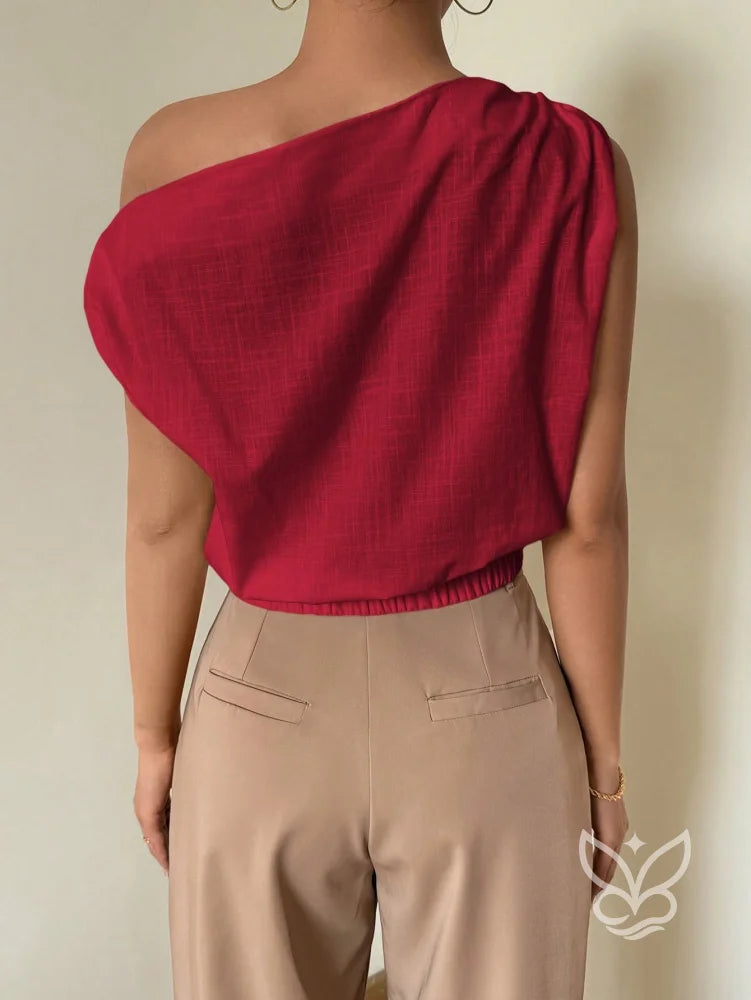 Blusa de Um Ombro com Caimento Solto e Elegante Blusa de Um Ombro com Caimento Solto e Elegante