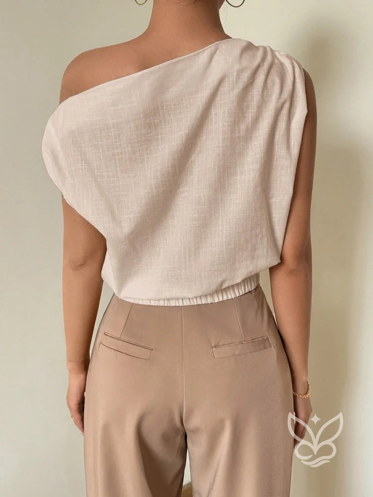 Blusa de Um Ombro com Caimento Solto e Elegante Blusa de Um Ombro com Caimento Solto e Elegante