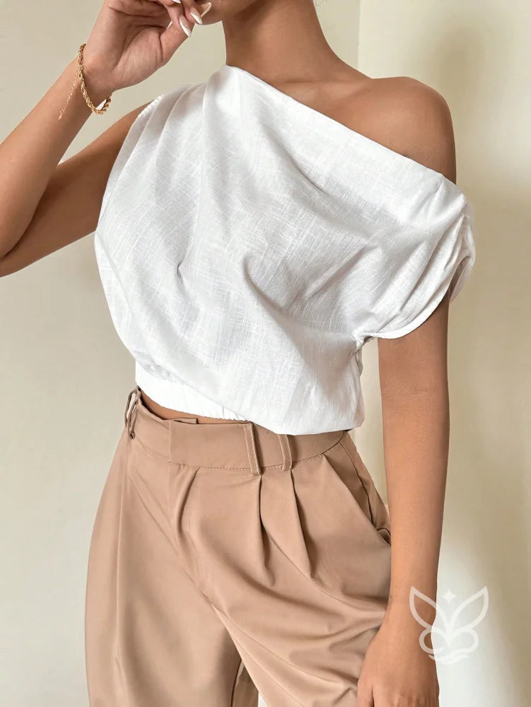 Blusa de Um Ombro com Caimento Solto e Elegante Blusa de Um Ombro com Caimento Solto e Elegante
