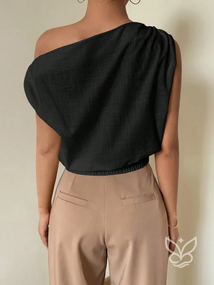 Blusa de Um Ombro com Caimento Solto e Elegante Blusa de Um Ombro com Caimento Solto e Elegante