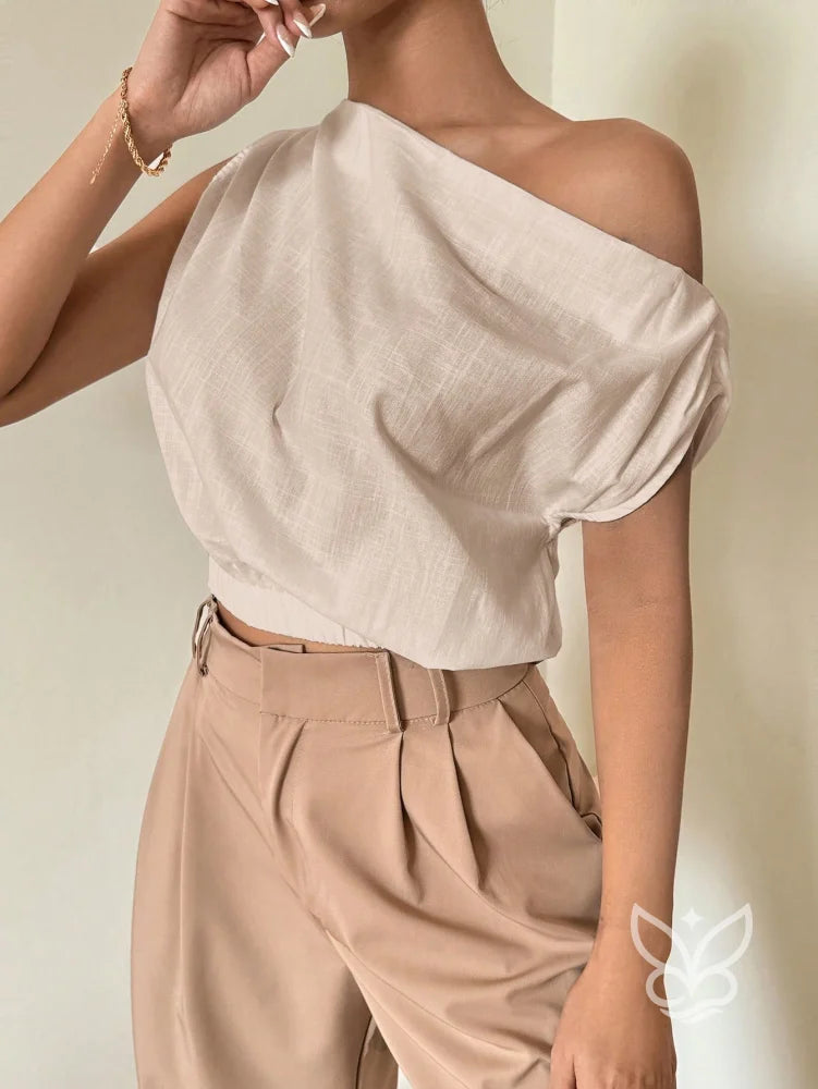 Blusa de Um Ombro com Caimento Solto e Elegante Blusa de Um Ombro com Caimento Solto e Elegante