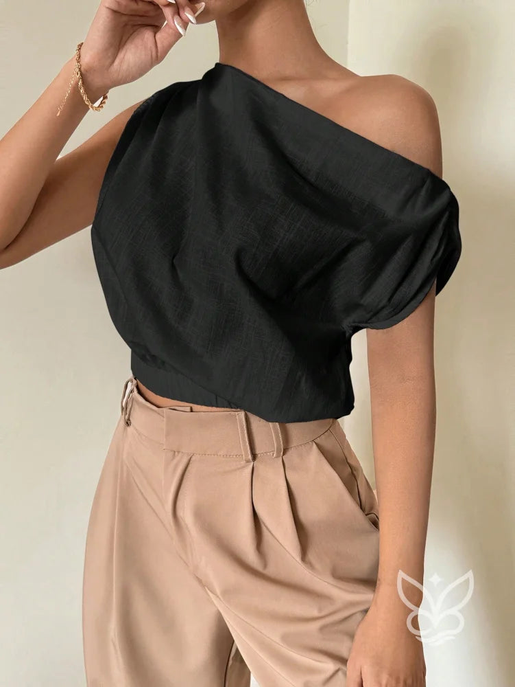 Blusa de Um Ombro com Caimento Solto e Elegante Blusa de Um Ombro com Caimento Solto e Elegante