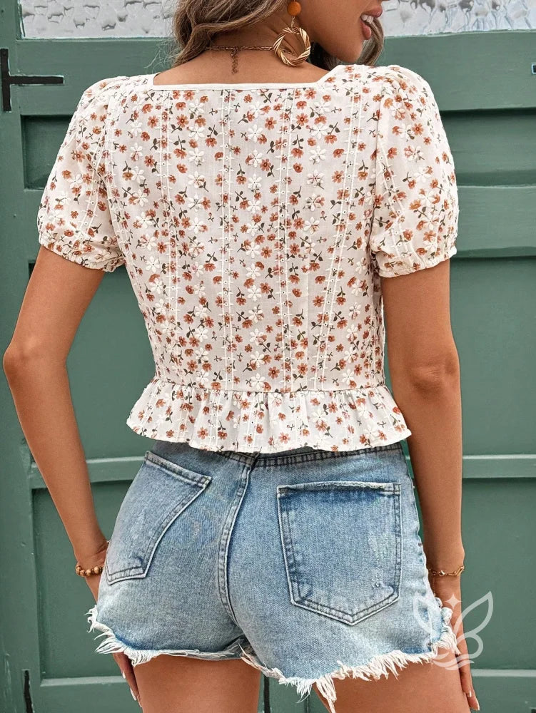 Blusa Floral Com Decote Coração E Lastex Na Cintura Blusa Floral Com Decote Coração E Lastex Na Cintura