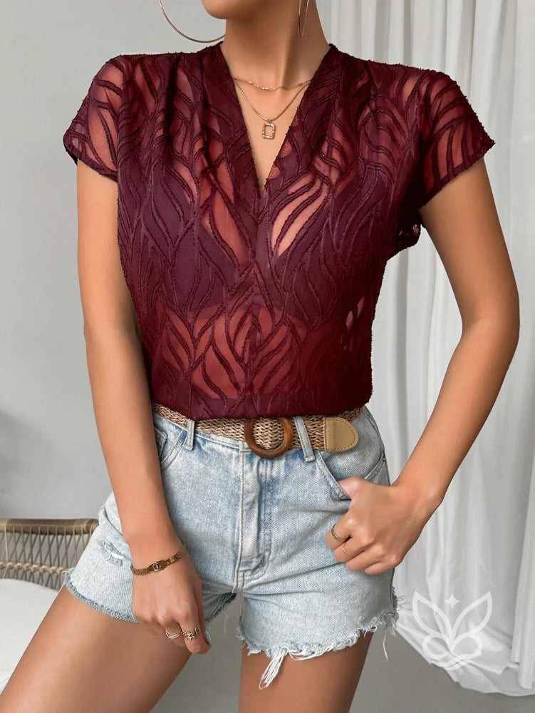 Blusa Jacquard Decote V Com Manga Curta E Caimento Sofisticado Blusa Jacquard Decote V Com Manga Curta E Caimento