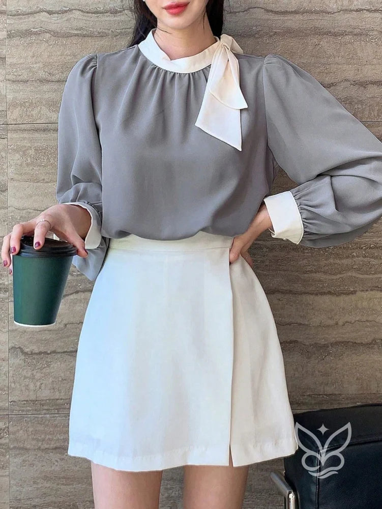 Blusa Manga Bufante Com Gola Alta E Punho Contrastante Blusa Manga Bufante Com Gola Alta E Punho Contrastante