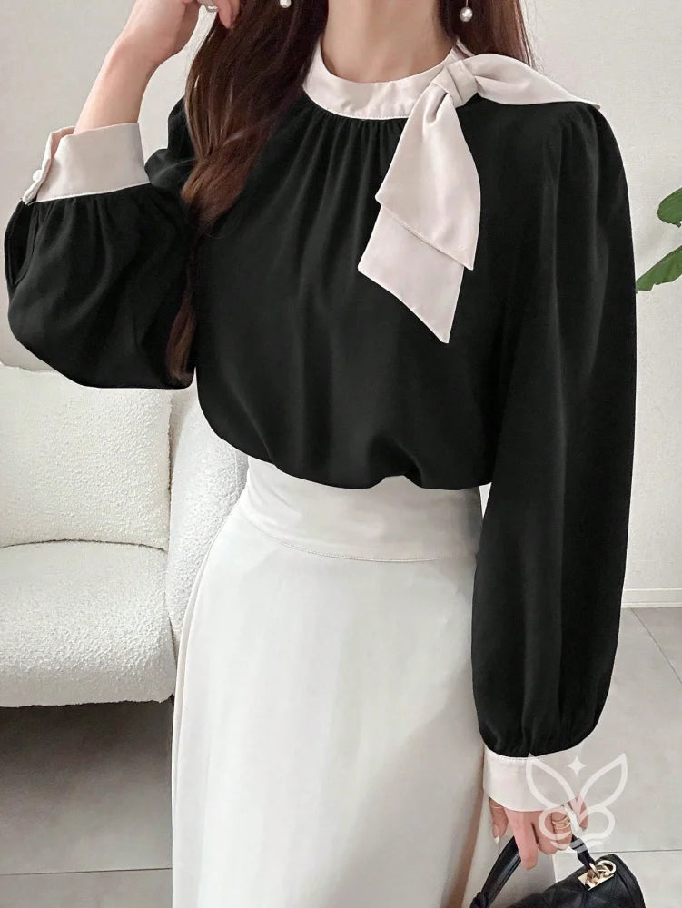 Blusa Manga Bufante Com Gola Alta E Punho Contrastante Blusa Manga Bufante Com Gola Alta E Punho Contrastante
