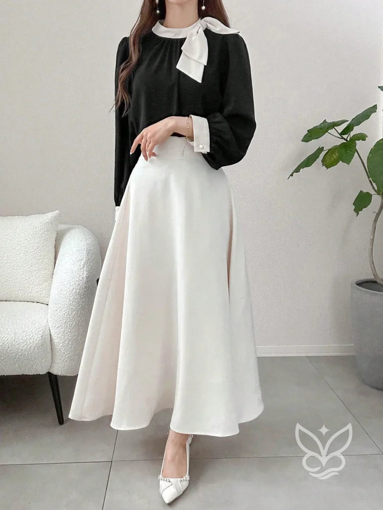Blusa Manga Bufante Com Gola Alta E Punho Contrastante Blusa Manga Bufante Com Gola Alta E Punho Contrastante