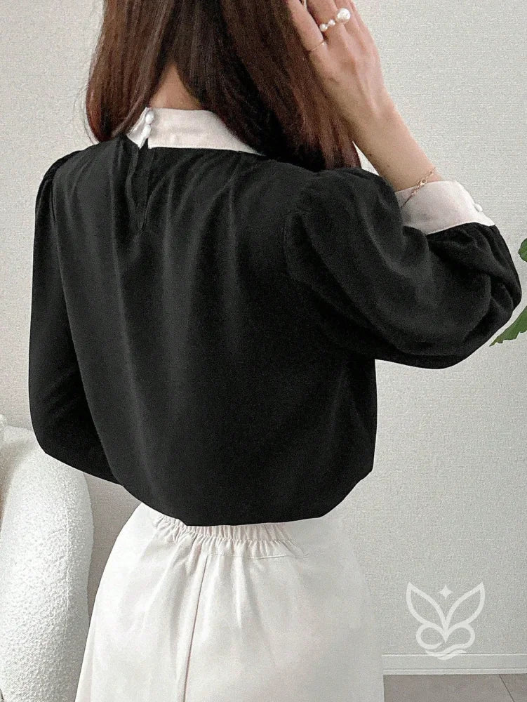 Blusa Manga Bufante Com Gola Alta E Punho Contrastante Blusa Manga Bufante Com Gola Alta E Punho Contrastante