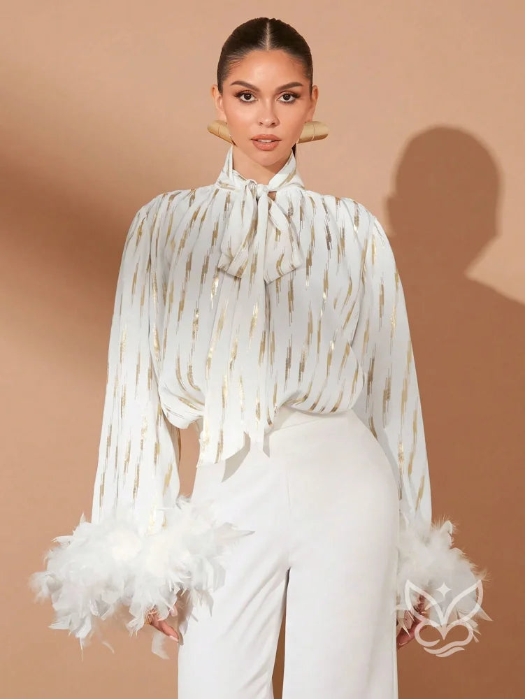 Blusa Manga Longa Com Gola Laço E Detalhes Em Plumas Blusa Manga Longa Com Gola Laço E Detalhes Em Plumas
