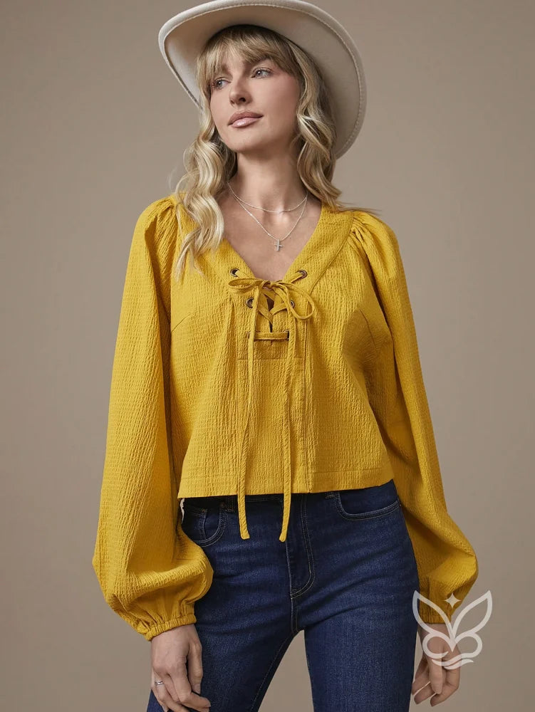 Blusa Manga Longa Em Algodão Com Decote Com Amarração Blusa Manga Longa Em Algodão Com Decote Com Amarração