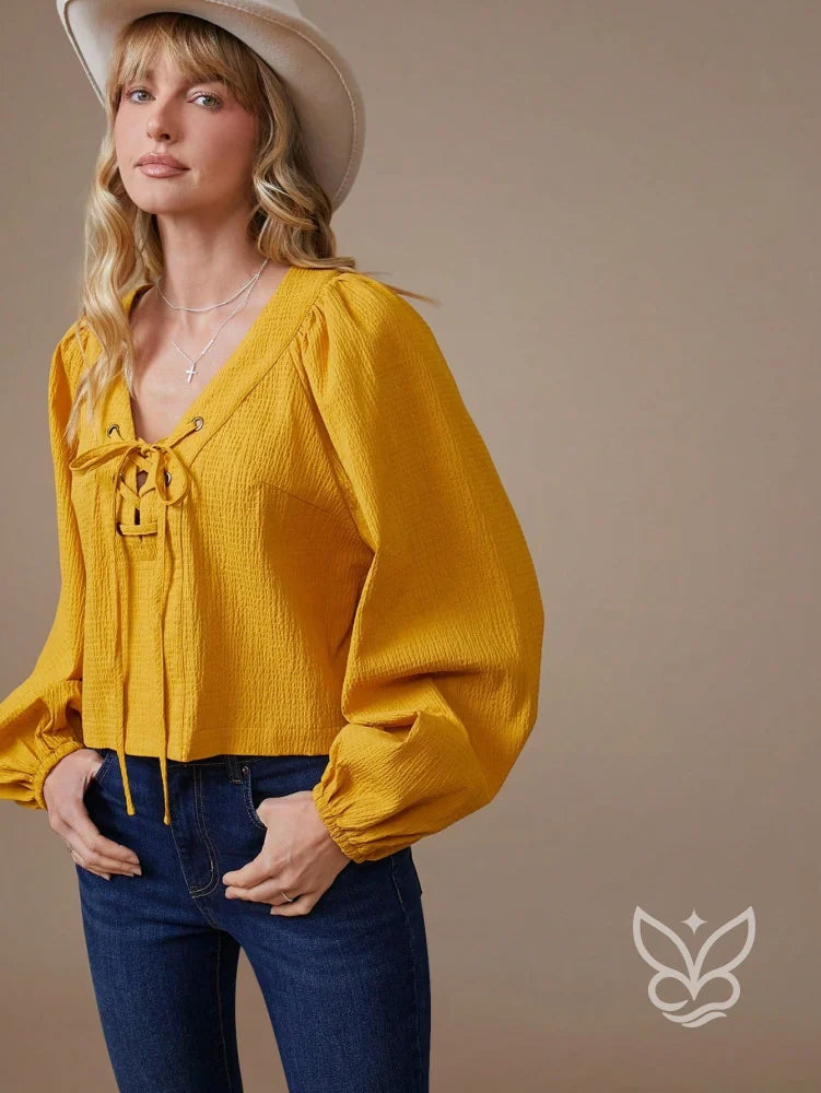 Blusa Manga Longa Em Algodão Com Decote Com Amarração Blusa Manga Longa Em Algodão Com Decote Com Amarração
