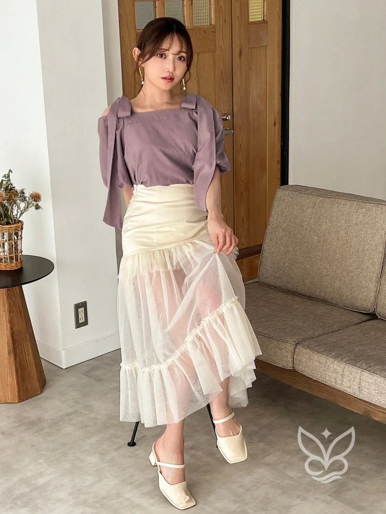 Blusa Ombro Caído Com Amarração E Caimento Fluido Blusa Ombro Caído Com Amarração E Caimento Fluido