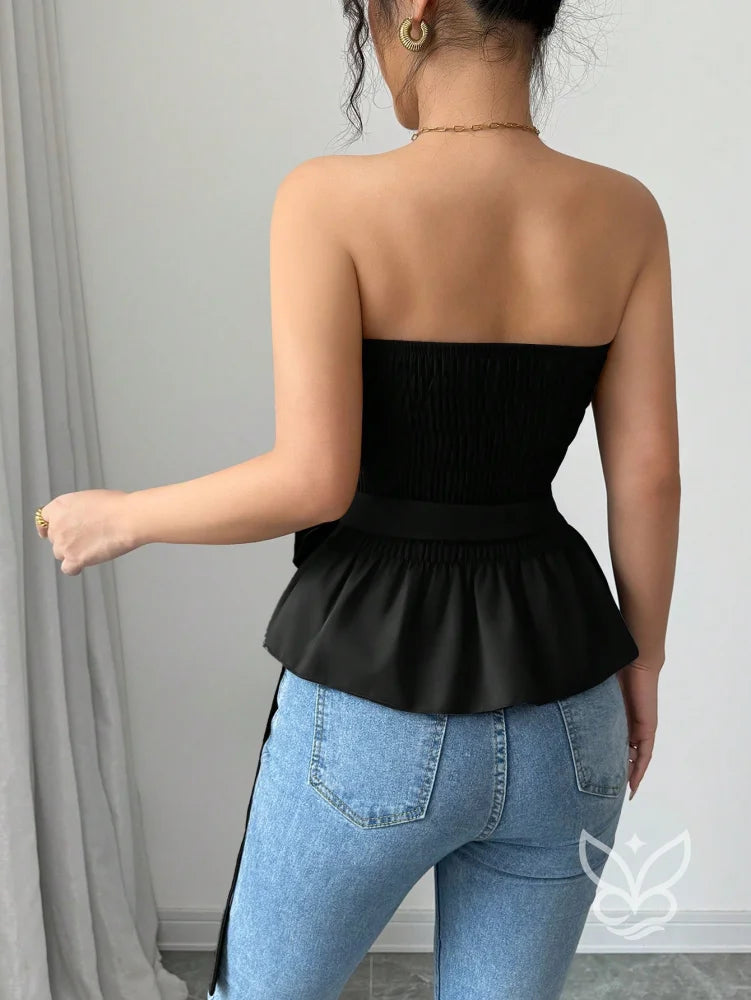 Blusa Peplum Minimalista Com Manga Bufante E Caimento Solto Blusa Peplum Minimalista Com Manga Bufante E Caimento Solto