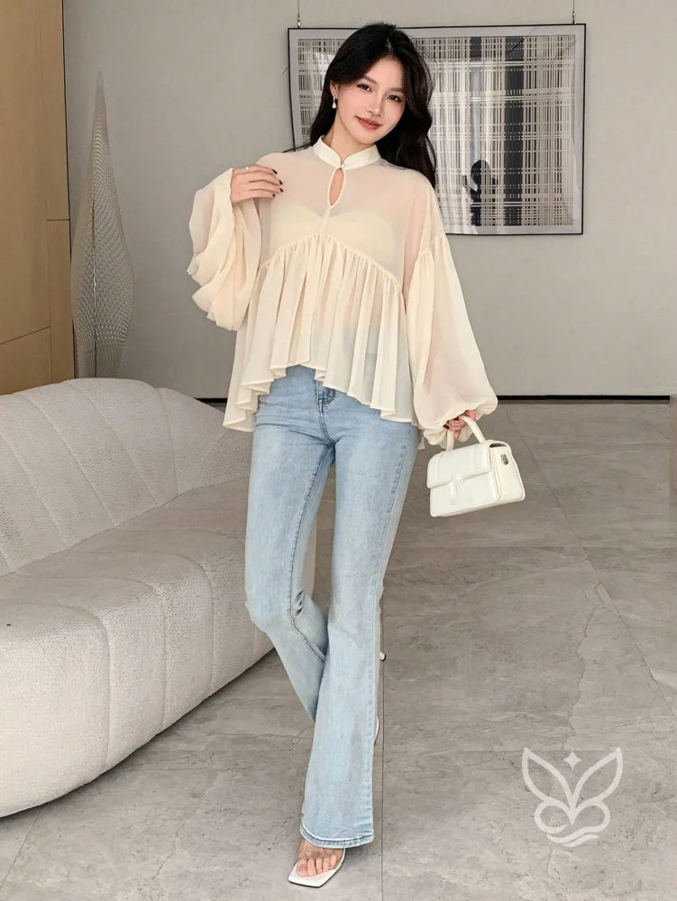 Blusa Plissada Com Gola Alta E Manga Longa Blusa Plissada Com Gola Alta E Manga Longa