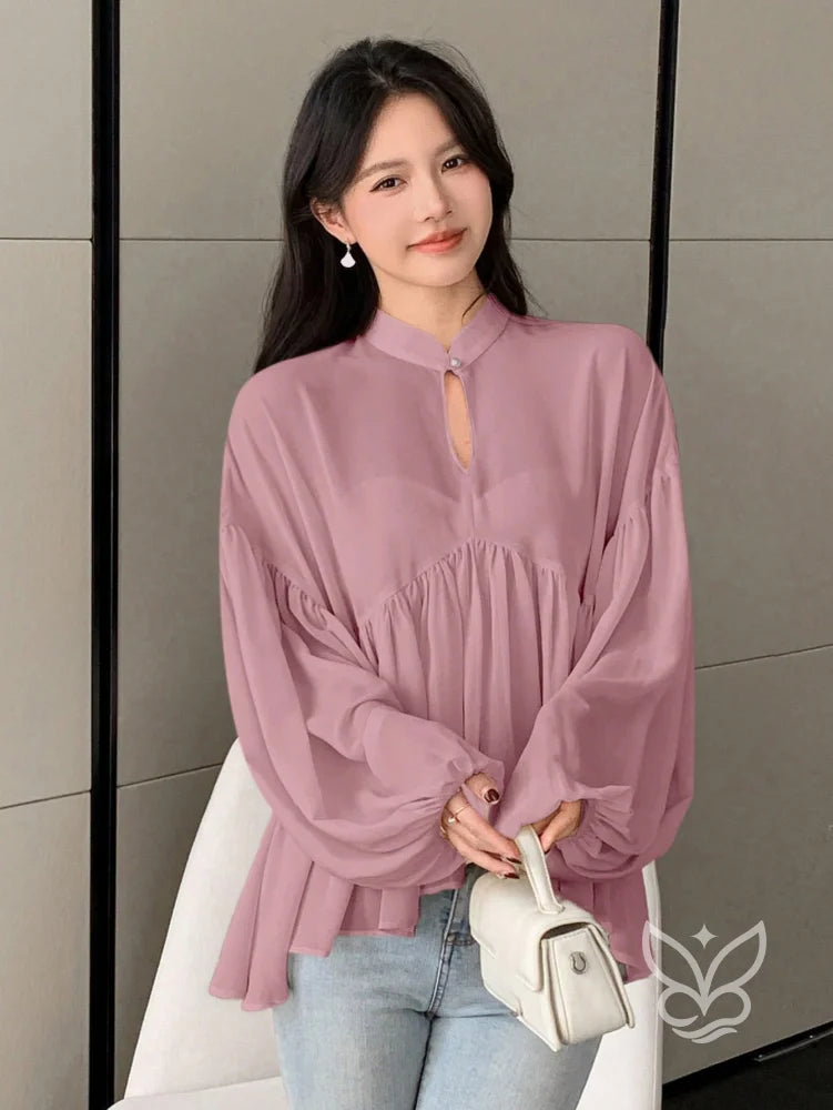 Blusa Plissada Com Gola Alta E Manga Longa Blusa Plissada Com Gola Alta E Manga Longa