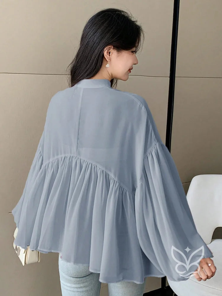 Blusa Plissada Com Gola Alta E Manga Longa Blusa Plissada Com Gola Alta E Manga Longa