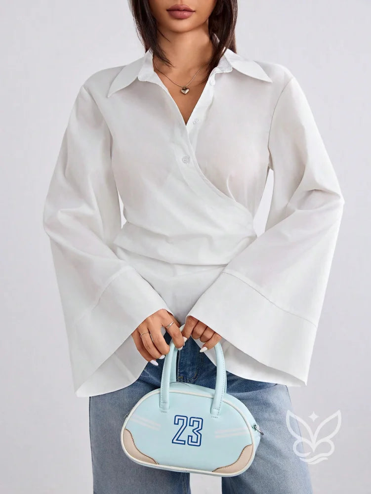 Blusa Transpassada com Manga Longa Flare Sofisticada Blusa Transpassada com Manga Longa Flare Sofisticada