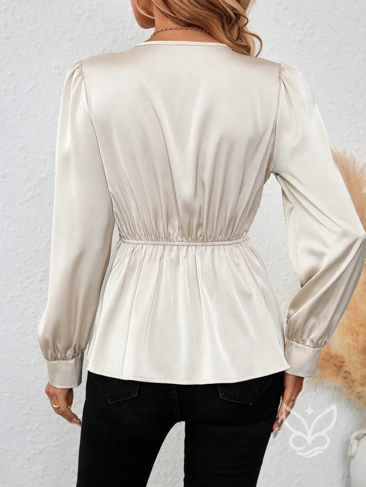 Blusa Transpassada Em Cetim Com Manga Longa E Cintura Alta Blusa Transpassada Em Cetim Com Manga Longa E Cintura Alta