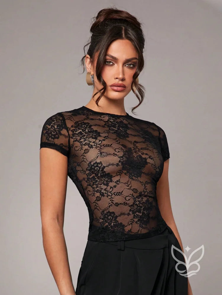 Blusa Tule Transparente Com Manga Curta E Decote Redondo Blusa Tule Transparente Com Manga Curta E Decote Redondo
