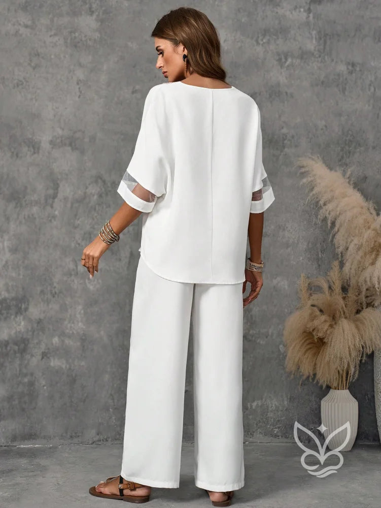 Conjunto Casual Com Blusa De Decote V E Calça Reta Sofisticada Conjunto Casual Com Blusa De Decote V E Calça Reta