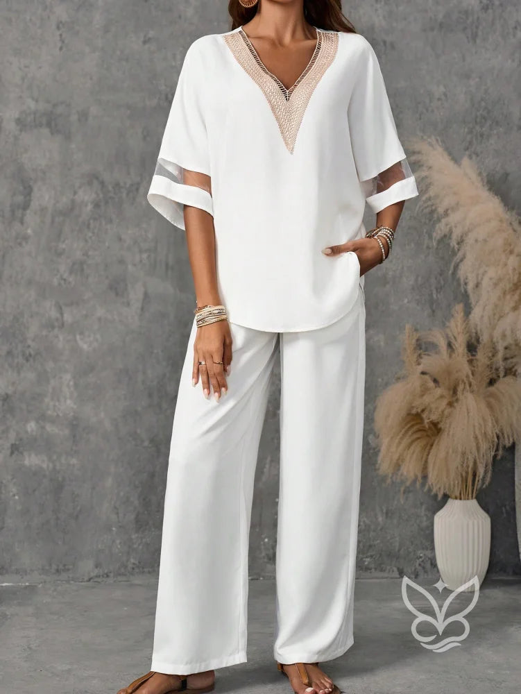 Conjunto Casual Com Blusa De Decote V E Calça Reta Sofisticada Conjunto Casual Com Blusa De Decote V E Calça Reta