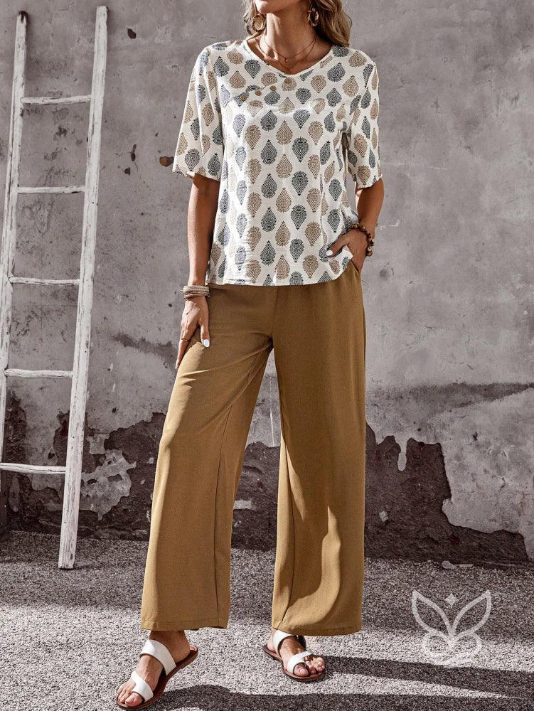 Conjunto Casual Com Blusa Estampada Assimétrica E Calça Reta Conjunto Casual Com Blusa Estampada Assimétrica E Calça