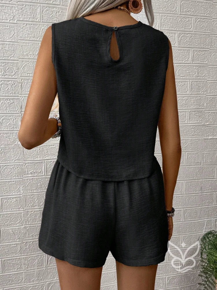 Conjunto Linho Com Bordado Floral E Shorts De Cintura Alta Conjunto Linho Com Bordado Floral E Shorts De Cintura Alta