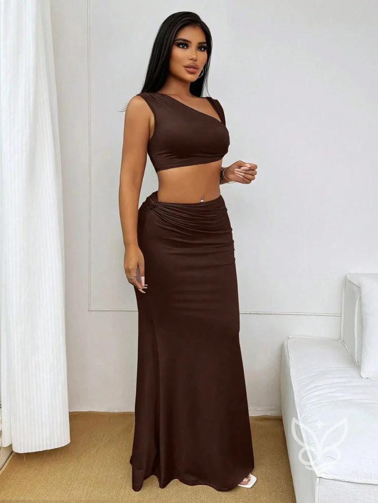 Conjunto Top Assimétrico E Saia Longa Ajustada Conjunto Top Assimétrico E Saia Longa Ajustada