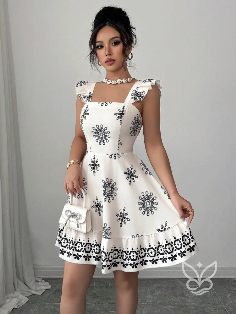 Vestido Curto Com Amarração Nas Costas E Mangas Fluídas Vestido Curto Com Amarração Nas Costas E Mangas Fluídas