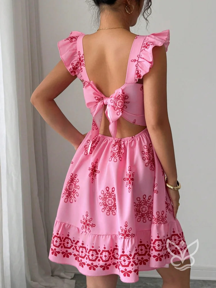Vestido Curto Com Amarração Nas Costas E Mangas Fluídas Vestido Curto Com Amarração Nas Costas E Mangas Fluídas