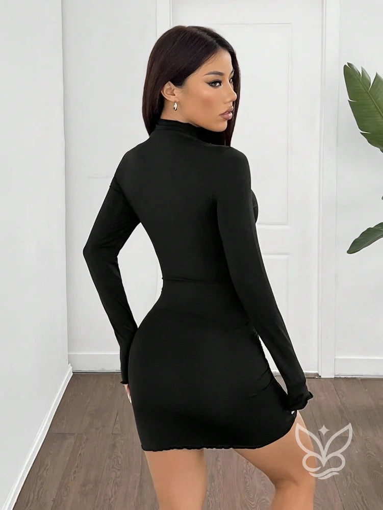Vestido Justo Curto Com Manga Longa E Gola Alta Vestido Justo Curto Com Manga Longa E Gola Alta