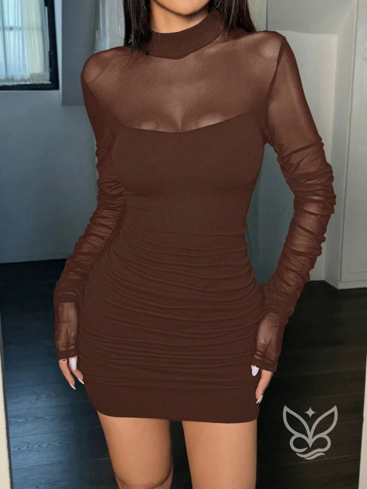 Vestido Justo Curto Com Manga Longa E Transparência Vestido Justo Curto Com Manga Longa E Transparência
