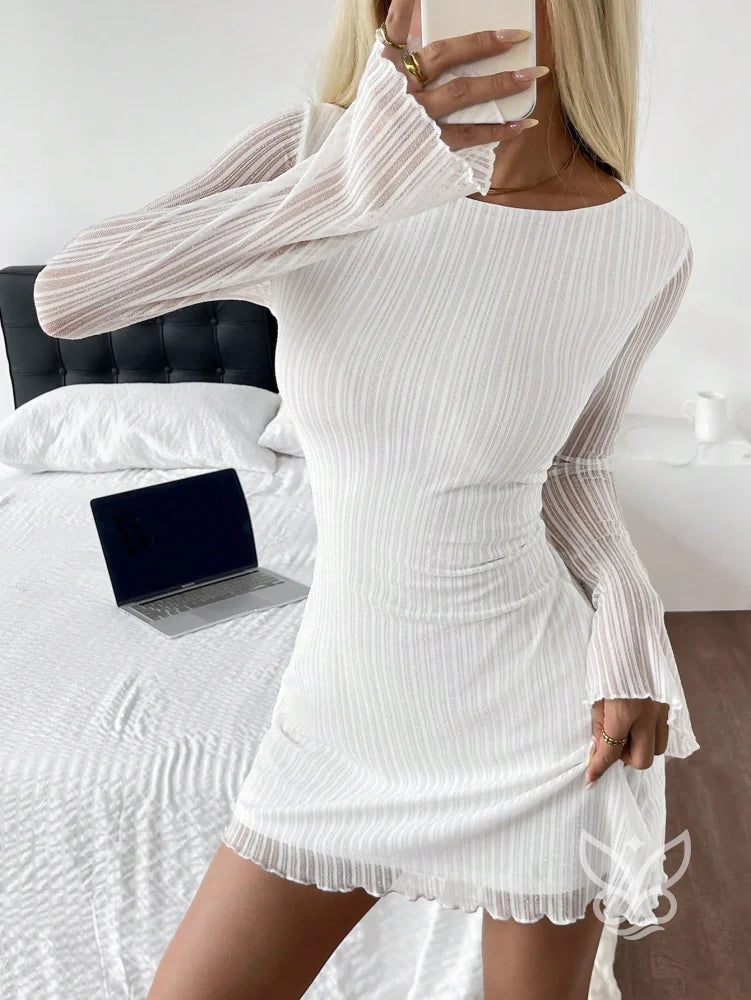 Vestido Justo De Manga Longa Com Transparência E Brilho Vestido Justo De Manga Longa Com Transparência E Brilho