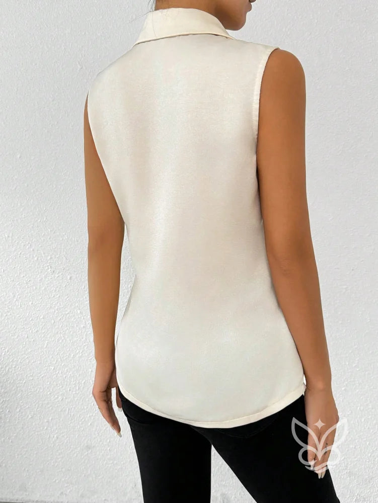 Blusa Alfaiatada Sem Manga Com Gola Lapela Elegante Blusa Alfaiatada Sem Manga Com Gola Lapela Elegante