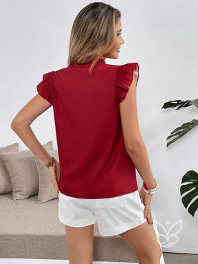 Blusa Bordada Floral Com Babados E Botões Frontais Blusa Bordada Floral Com Babados E Botões Frontais