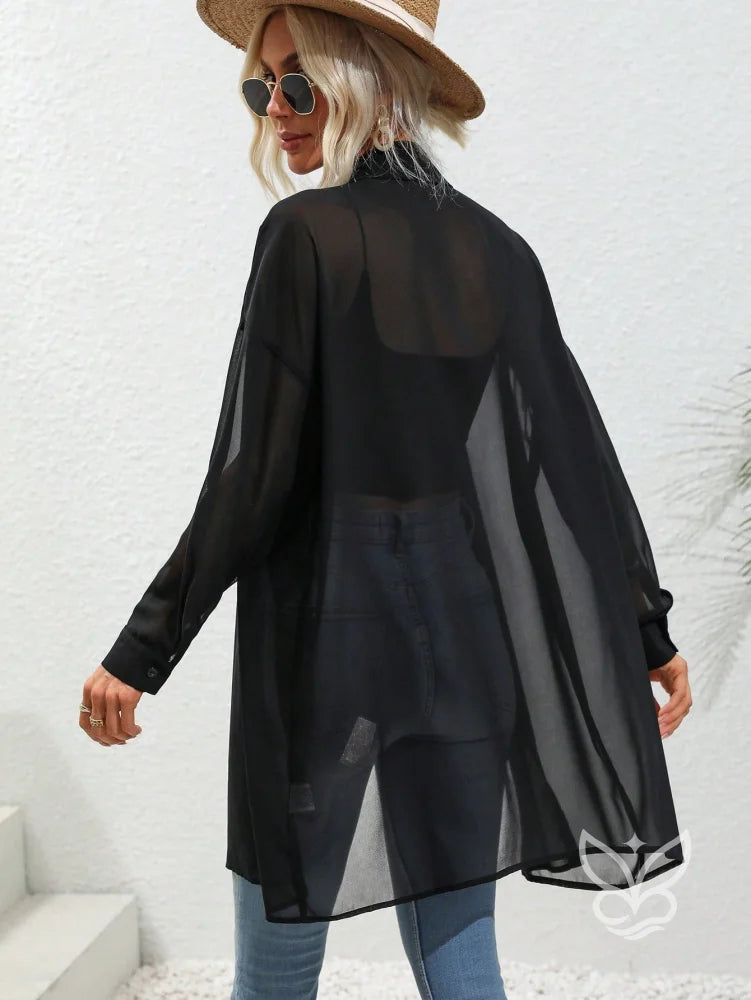 Blusa Botões Frontais Com Manga Drop Shoulder e Manga Longa Blusa Botões Frontais Com Manga Drop Shoulder e Manga Longa