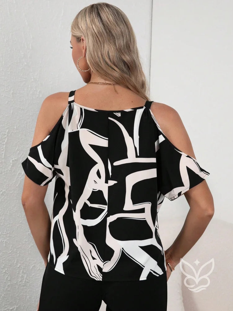 Blusa Cold Shoulder Com Corrente E Estampa Blusa Cold Shoulder Com Corrente E Estampa