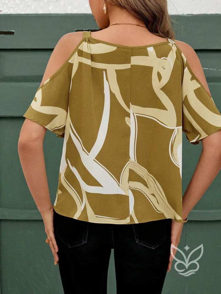 Blusa Cold Shoulder Com Corrente E Estampa Blusa Cold Shoulder Com Corrente E Estampa