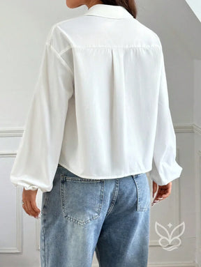 Blusa com Amarração Frontal e Manga Longa Bufante Blusa com Amarração Frontal e Manga Longa Bufante