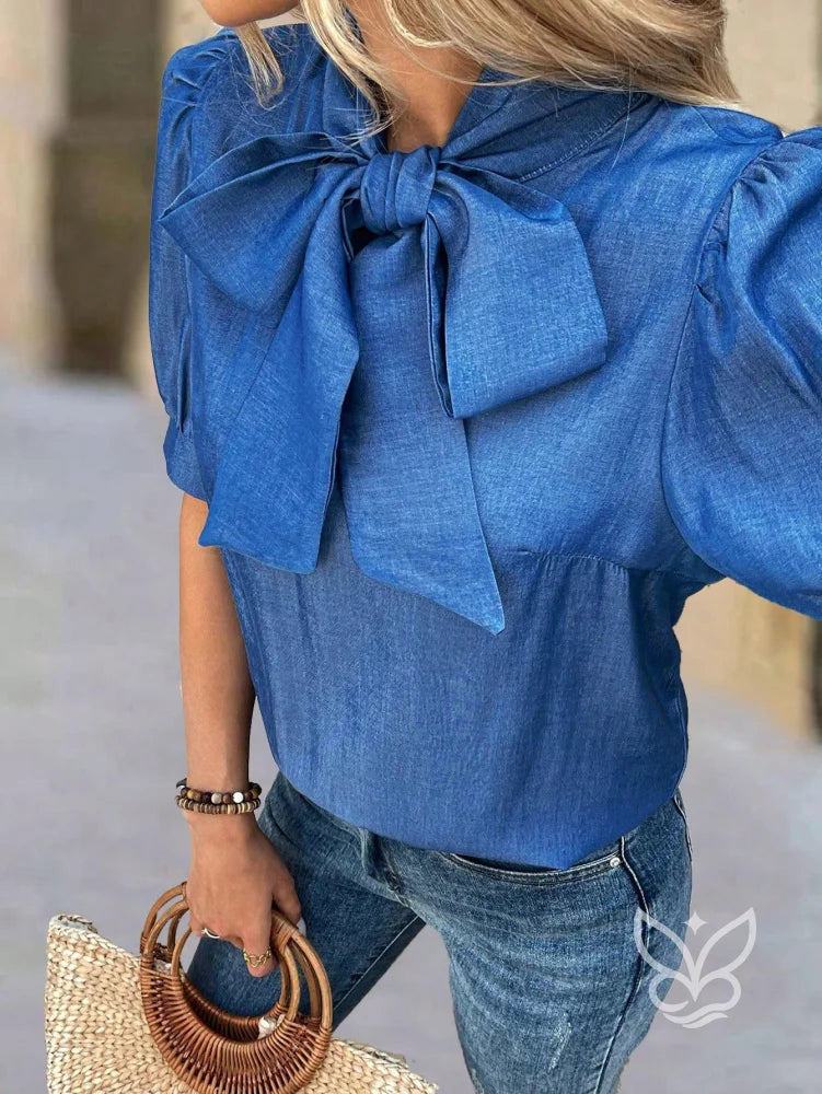 Blusa Com Gola Laço E Manga Bufante Com Pregas Blusa Com Gola Laço E Manga Bufante Com Pregas